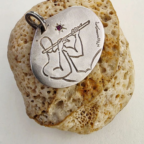 Silver pendant Nikos Eggonopoulos 925 with ruby like new, lucky charm 2001