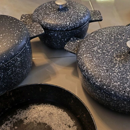 Heavy cookware set used with lids and large frying pan