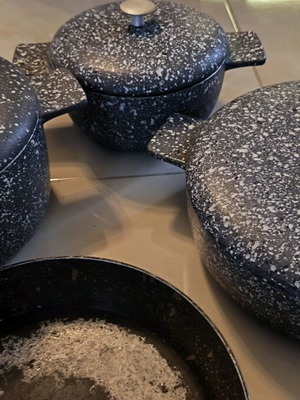 Heavy cookware set used with lids and large frying pan