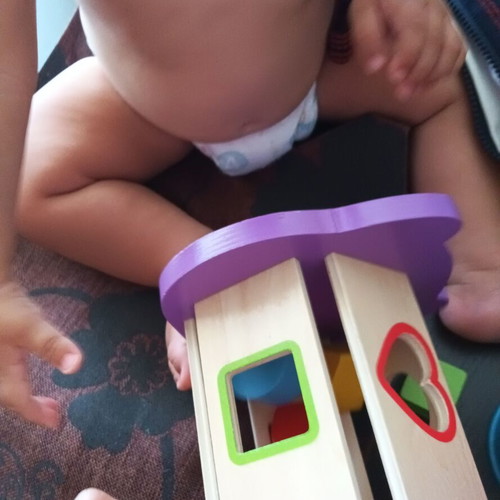 Toy set used with stacking cups and wooden owl shape sorter