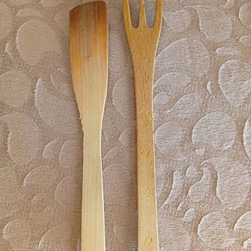 Pair of wooden kitchen utensils