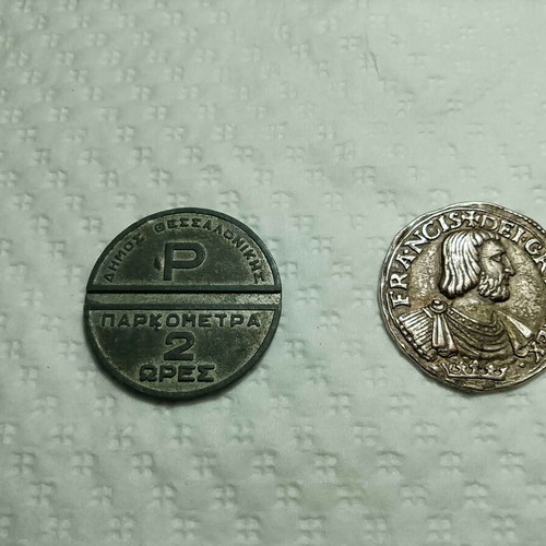Collectible tokens used, Thessaloniki parking 1980 and BP gasoline 1960