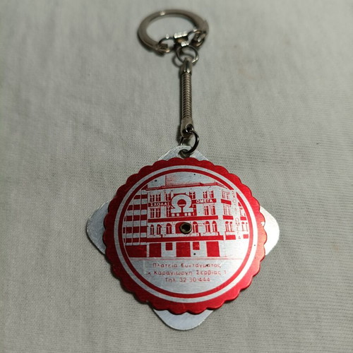 Omega Schools vintage promotional keychain calendar 1973-2000 used