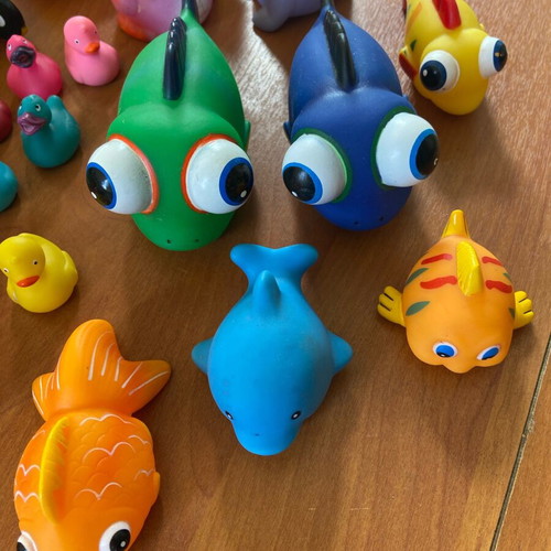 Collection of ducks and fish toys used for decoration and crafts
