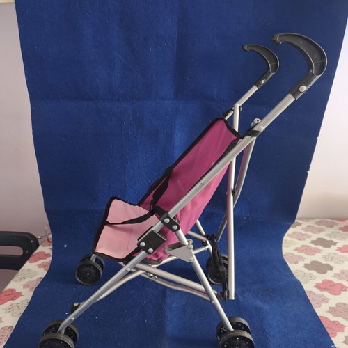 Toy stroller like new, lightweight and foldable