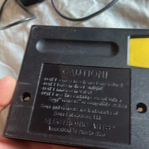 Sega Mega Drive NHL 96 game and RF tuner pack