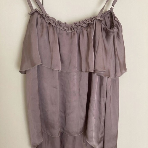 Asymmetric top like new, synthetic with ruffles, size M