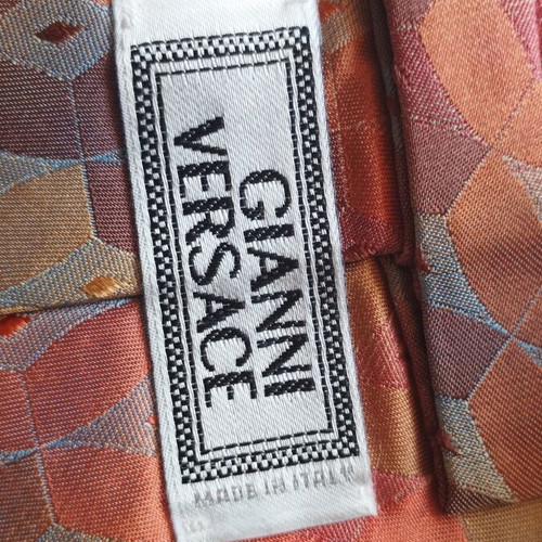 Gianni Versace tie like new, 100% silk, geometric diamond pattern