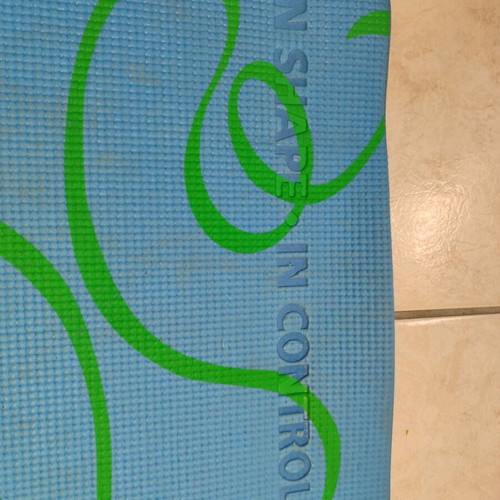 Exercise mat used with visible signs of wear