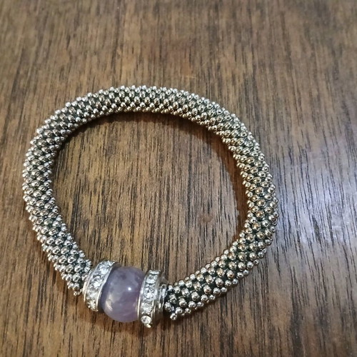 Women's bracelet with purple stone and white gems like new