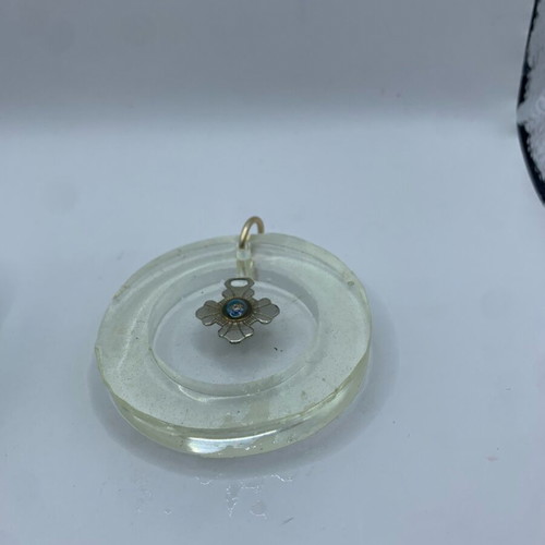 Silver cross with eye and wooden cross in liquid glass new