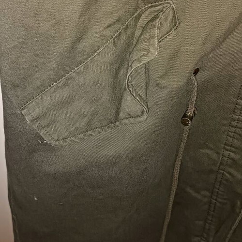 Khaki parka like new with red fur lining, size M