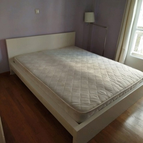 Double bed and double mattress with TV shelf used for bedroom