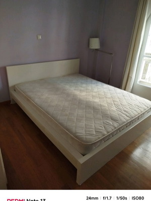 Double bed and double mattress with TV shelf used for bedroom