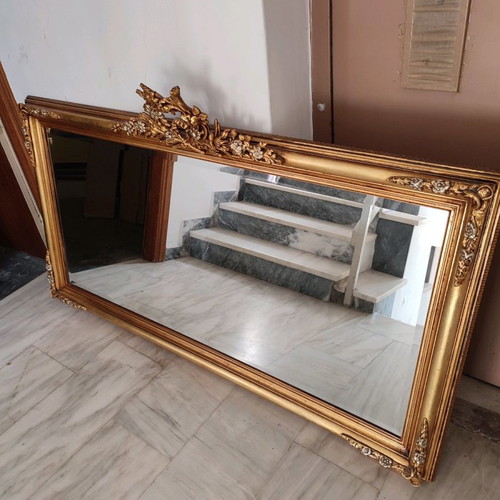 Carved mirror in gold color like new