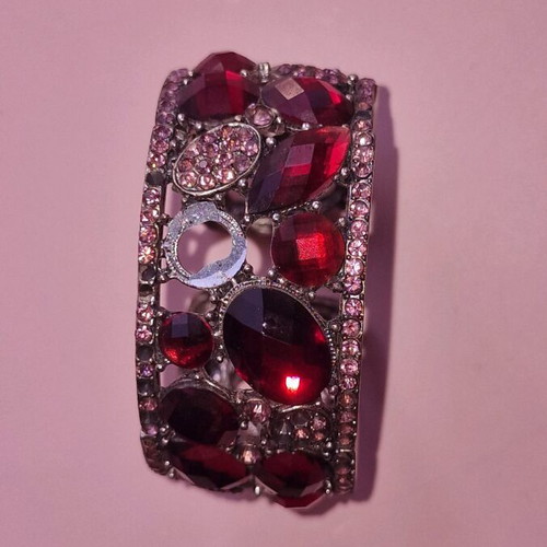 Bracelet used with pink and red stones, some stones missing