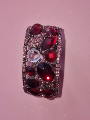 Bracelet used with pink and red stones, some stones missing