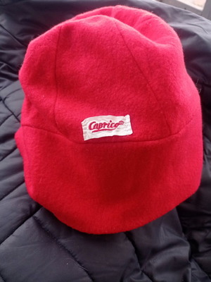 Red knitted Caprice hat slightly used