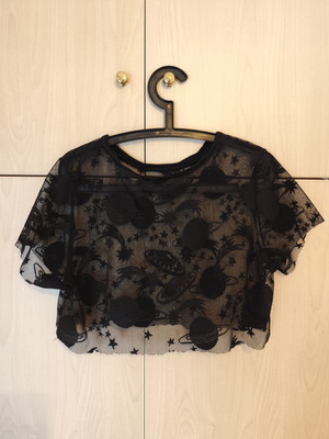Sheer women's short-sleeve blouse with planet designs