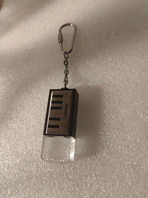 Vintage keychain used, Yamaha piano design