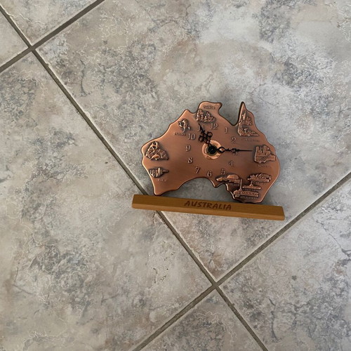 Bronze Australia-shaped clock