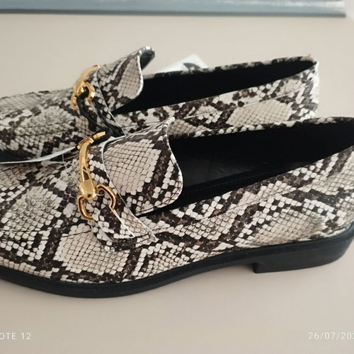 Calliope black and white moccasins new with tag