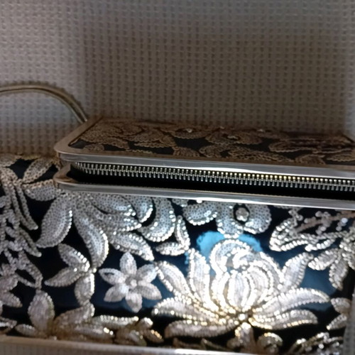 Clutch bag with floral gold sequin embroidery and matching wallet
