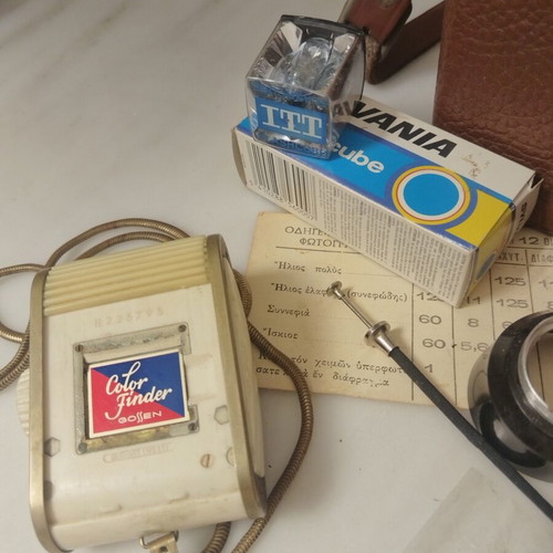 Vintage camera accessories in leather case used