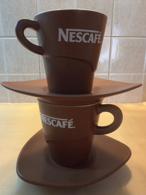 Nescafé ceramic mug set with saucers like new