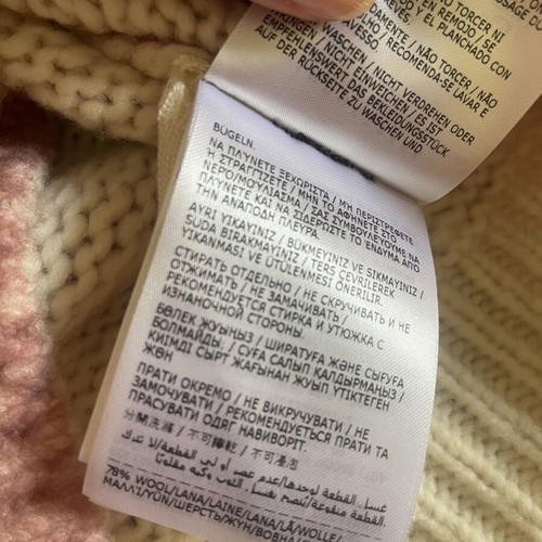 Moncler pink wool sweater with llama design, size 10 years