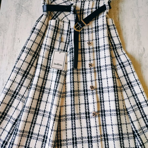 Women's skirt with belt and pockets new, knee-length, black and white