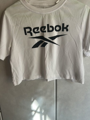 Reebok women's shirt medium like new, black and white