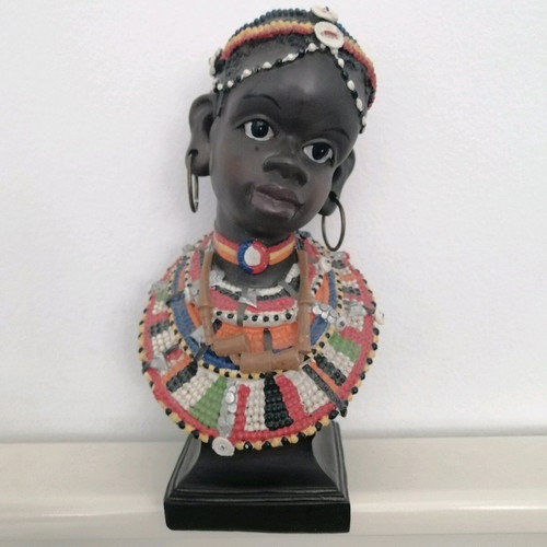African figurine like new with intricate bead jewelry