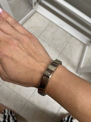 Bracelet Reiss London used, gold and black colors
