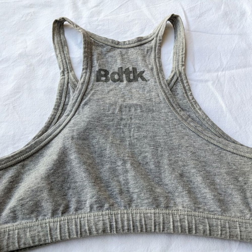 Bdtk two used sports bras size Medium, black and gray