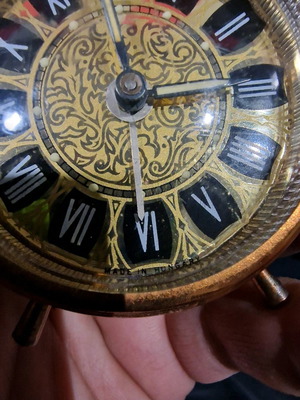 Winding table clock used for repair
