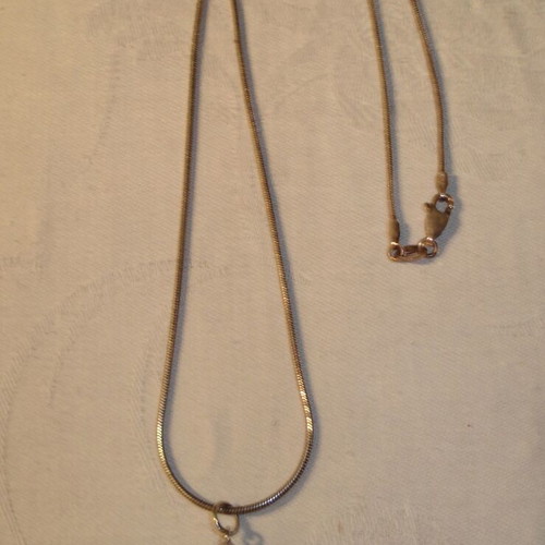 Necklace with black pearl and 925 silver chain like new