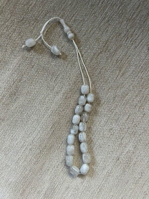 Worry beads used with translucent white resin beads