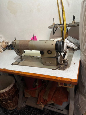 JUKI DDL-227 professional sewing machine used with table