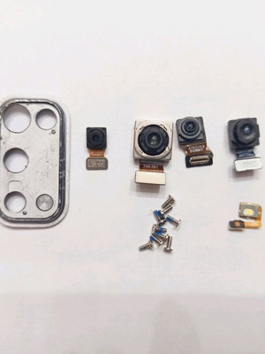 Realme 7 Pro used parts with 4 cameras and screws