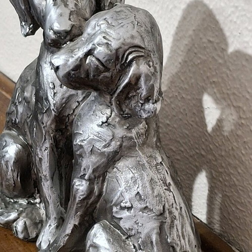 Decorative wooden figurine of loving dogs like new