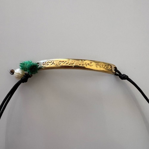 Bracelet with stainless steel element and pearl
