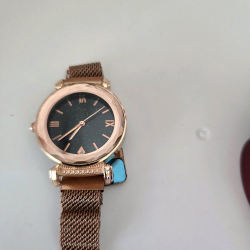 Wristwatch new, unworn, gold color, women's