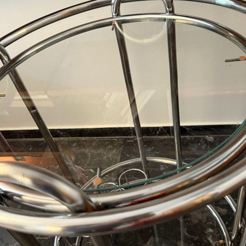 Vintage round trolley bar used with chrome tubular steel and glass shelves