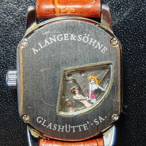 Mechanical watch with hidden erotic scene used