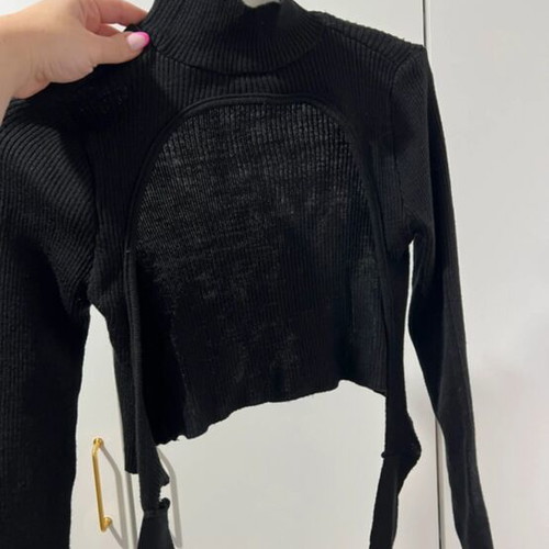 Black long-sleeve shirt with open back like new