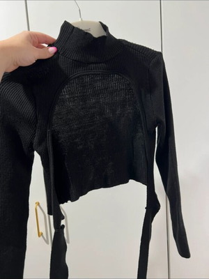 Black long-sleeve shirt with open back like new