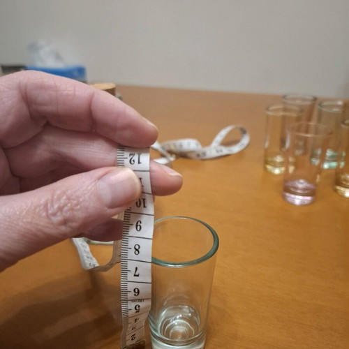 Set of 5 Colored Shot Glasses with Bottle like new