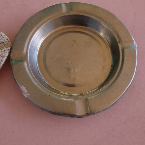 Ashtrays used, one plastic and one metal, set of 2