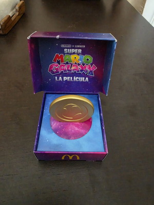 Super Mario Galaxy Coin like new, rare collectible with egg design